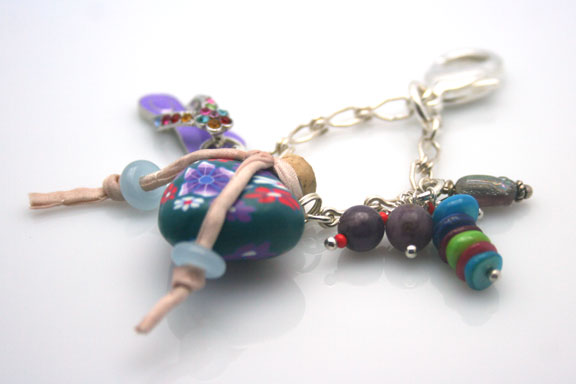 close-up- photo of the beads and the mini-aromatherapy bottle