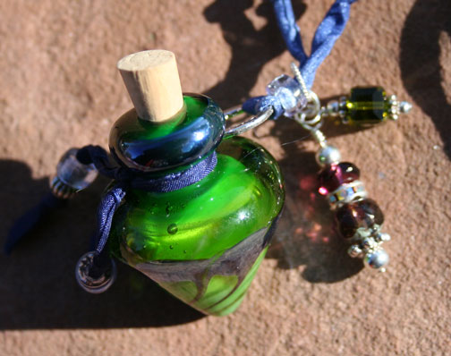 aromatherapy pendant on silk cord with sterling silver, crystals, and glass beads