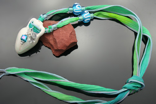 aromatherapy necklace on silk ribbon