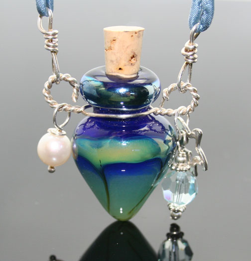 lampwork glass bottle necklace with charms