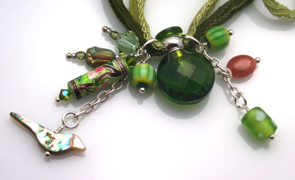 antique beads, abalone shell bird and more beautiful beads on this aromatherapy necklace