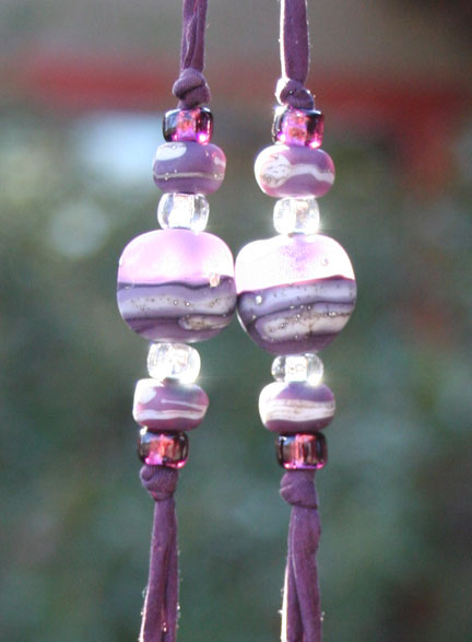 organic lampwork beads adorn this amazing aeomatherapy necklace