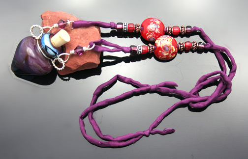 aromatherapy jewelry with glass, silver, and copper beads