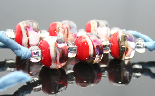 gorgeous lampwork beads adorn this lovely aromatherapy necklace