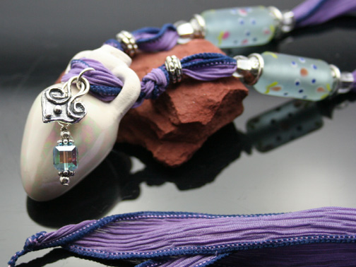 close-up of the aromatherapy amphora necklace