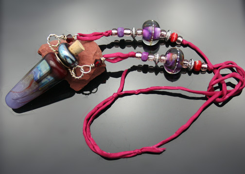 aromatherapy jewelry on silk cord with lampwork beads, silver wire, and silk cording