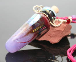 stunning purple aromatherapy pendant with silk cord and beads