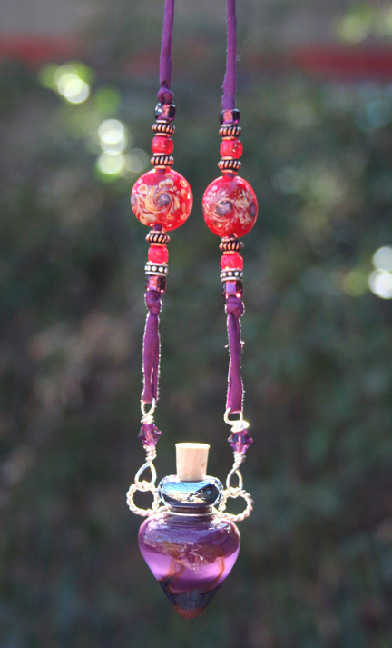 purple glass aormatherapy bottle necklace