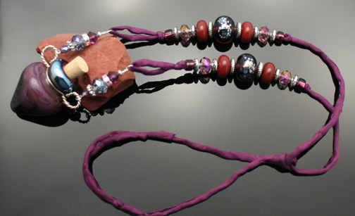 purple glass aormatherapy bottle necklace