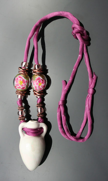 aromatherapy jewelry with an amphora, silk, and gorgeous beads