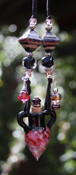 beautiful aromatherapy necklace with silk cord and stunning crystal dangles