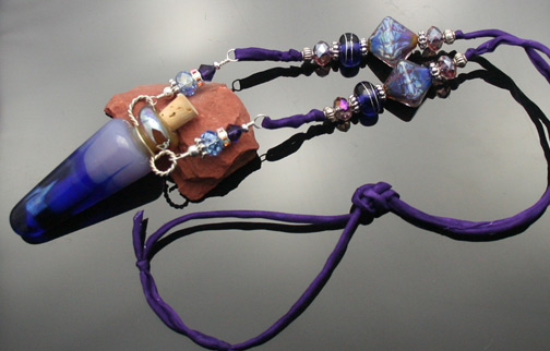 glass aroma pendant with silk cord and silver and copper beads