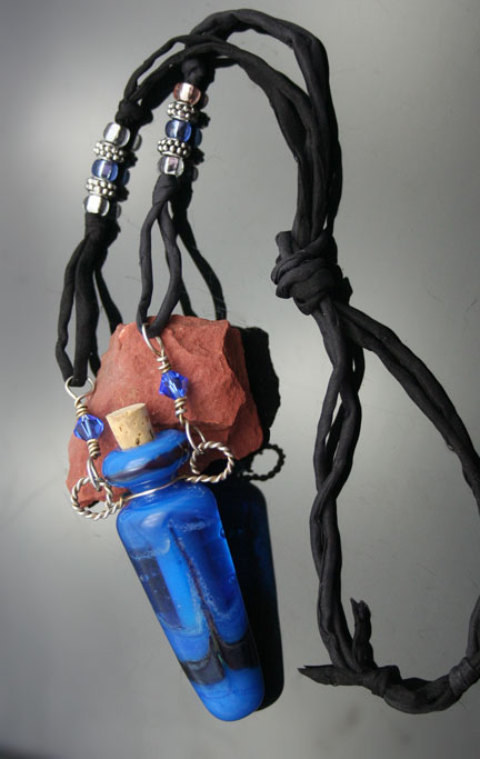 Unique aromatherapy jewelry on silk cords with silver and glass beads