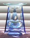 Picture of a modern, blue glass essential oil diffuser