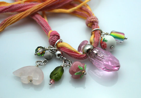 aromatherapy jewelry with mini-bottle pendants and charms