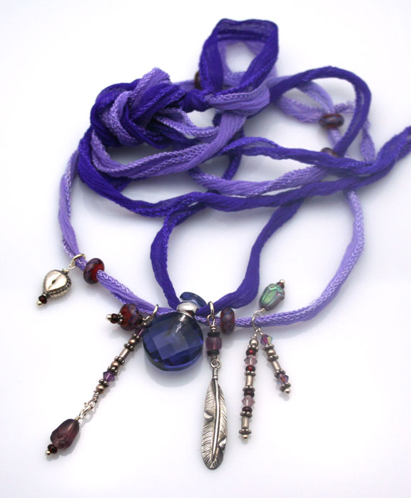 Purple passion aromatherapy necklace with sterling silver beads and charms