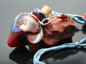 glass aromatherapy bottle necklace with lampwork beads